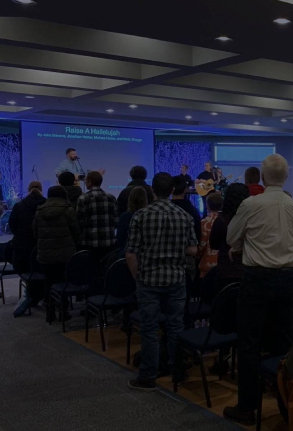 A congregation worshiping together in a photo featured by the Center for Church Renewal.
